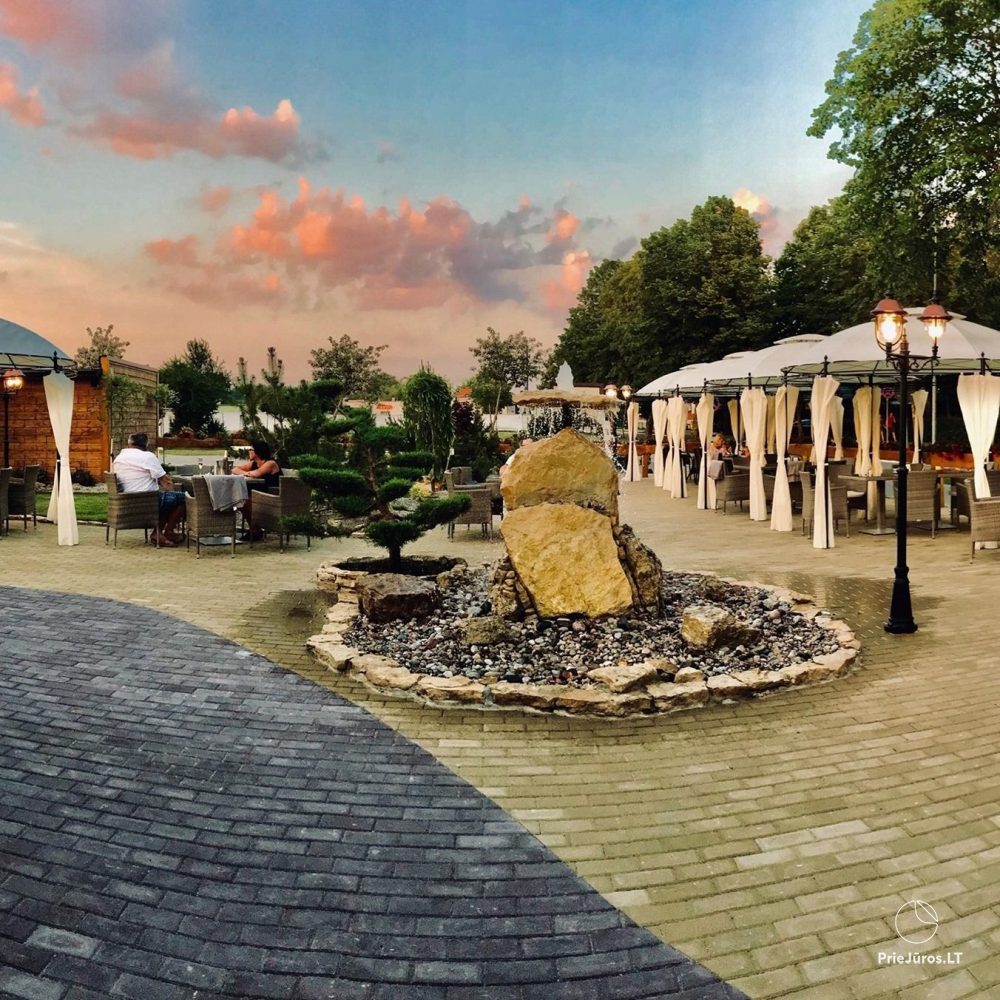 Restaurant Floros Simfonija in Sventoji, Topolių Straße 1
