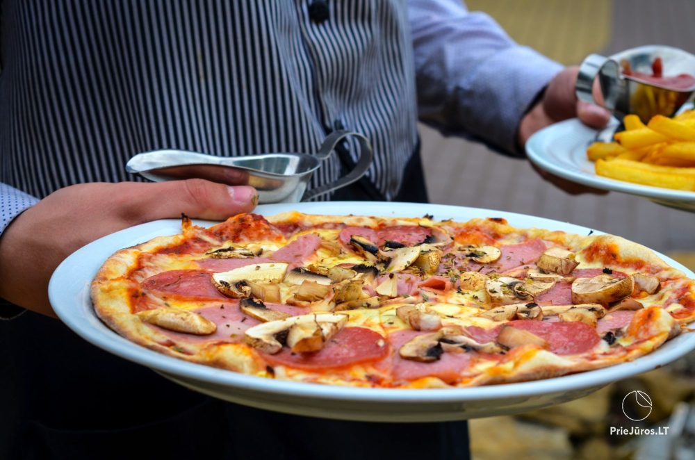 Restaurant Floros Simfonija in Sventoji, Topolių Straße 1