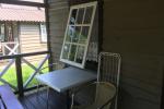 Wooden house (quadruple, for 5 persons) with two separate rooms, terrace and common bathroom