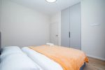 Orangefarbenes Apartment mit Terrasse für 4 Personen, 40 qm.